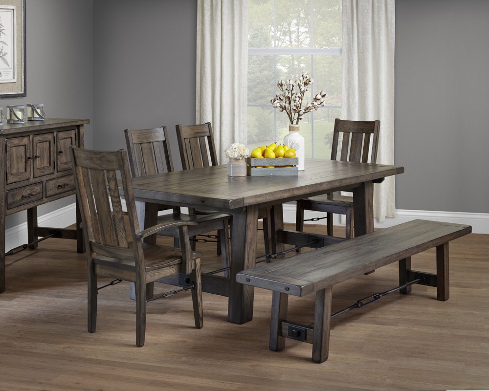 Ouray staged dining set featuring table, chairs, and bench in distressed brown.