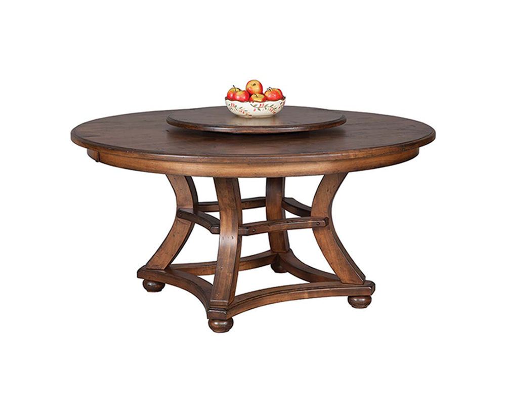 Marshfield lazy susan table with apple bowl on it.