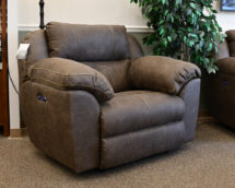 Large recliner in brown leather looking fabric.